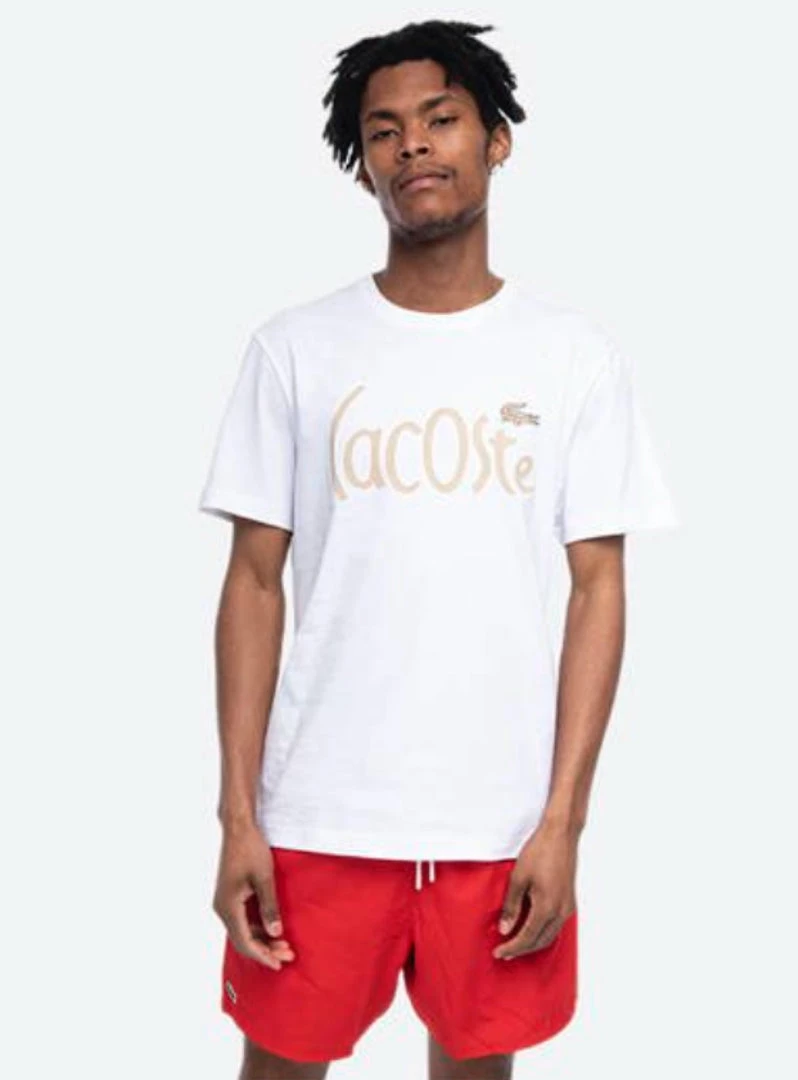 Shop All Lacoste T-Shirt - Warped Text - White - TH0049 51 001 1 Shop All Lacoste T-Shirt - Warped Text - White - TH0049 51 001
