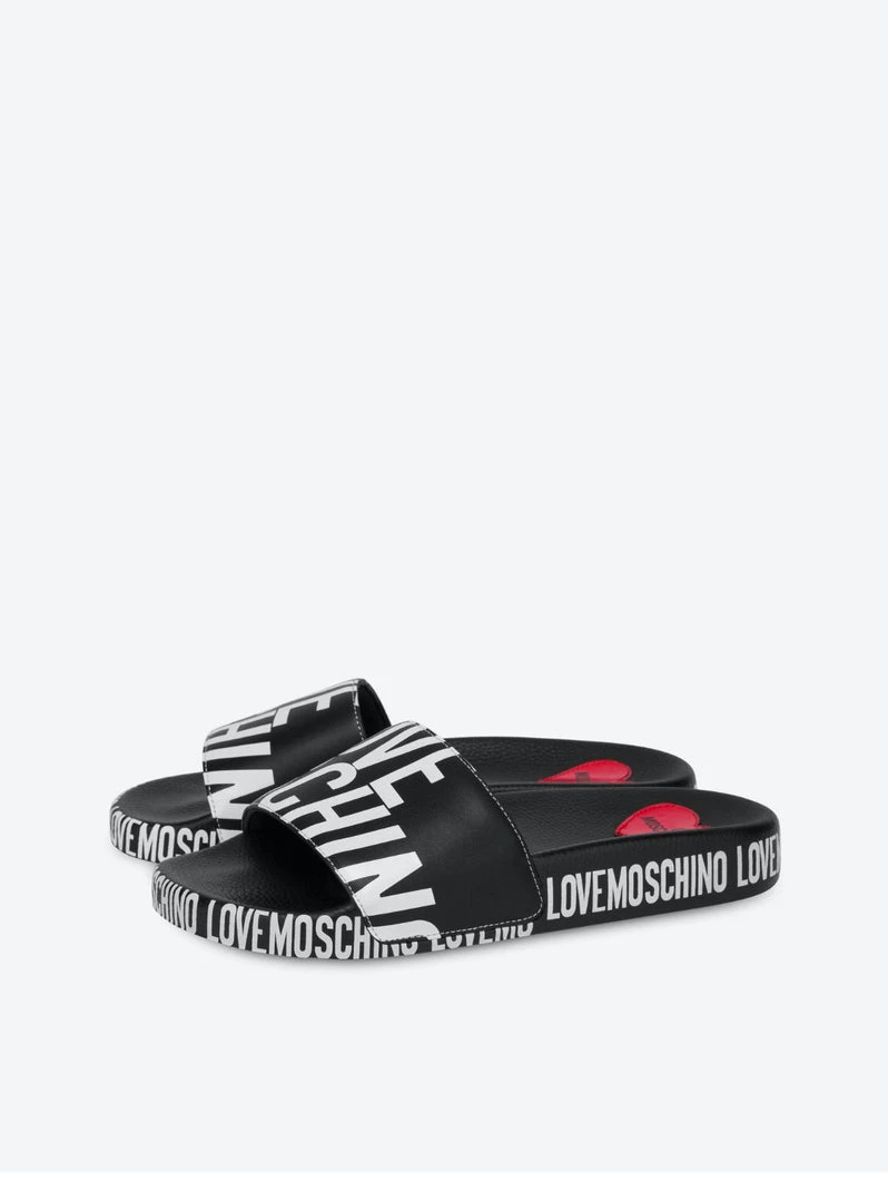 Shop All Moschino Slides - Pool Slides With Logo - Black - JA28032G1CI12000 1 Shop All Moschino Slides - Pool Slides With Logo - Black - JA28032G1CI12000
