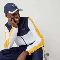 Lacoste Tracksuit - ColorBlocked - Navy With White And Yellow - WH2104 Shop All 9 Lacoste Tracksuit - ColorBlocked - Navy With White And Yellow - WH2104 Shop All